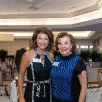 Pat Waring and Natalie Bernecker smiling and posing for photo